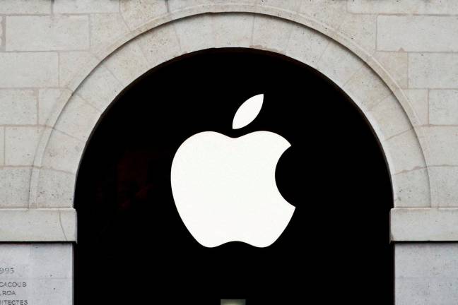 Apple logo is seen on the Apple store at The Marche Saint Germain in Paris, France July 15, 2020. - REUTERSpix