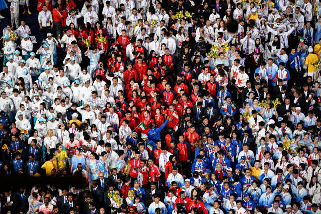 Members of national contingents parade during the closing ceremony of the 2022 Asian Games at the Hangzhou Olympic Sports Centre Stadium in Hangzhou in China’s eastern Zhejiang province on October 8, 2023. - AFPpix