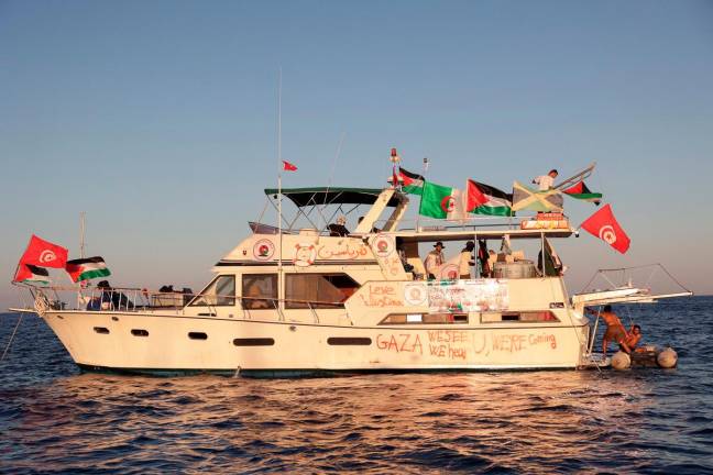 A boat, part of the Global Sumud Flotilla aiming to reach Gaza and break Israel’s naval blockade, sails off Koufonisi islet, Greece, September 26, 2025. - REUTERS