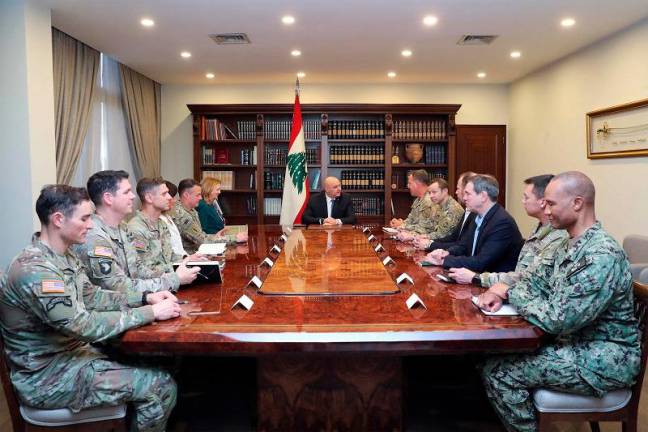 This handout picture provided by the press office of the Lebanese presidency shows Lebanon's new President Joseph Aoun (C) receiving Lieutenant General Michael Kurilla (C-R), commander of the US Central Command, and his accompanying delegation at the presidential palace in Baabda, east of Beirut on January 13, 2025. - AFP PHOTO / HO / LEBANESE PRESIDENCY