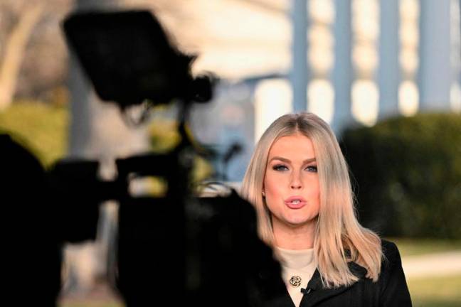 White House Press Secretary Karoline Leavitt speaks during an interview with a local network on the grounds of the White House in Washington, DC, on January 22, 2025. - ROBERTO SCHMIDT / AFP