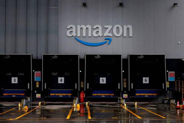 FILEpix: The logo of U.S. online retailer Amazon is displayed at a logistics centre in Trapagaran, northern Spain, Novr 22, 2023. REUTERSpix