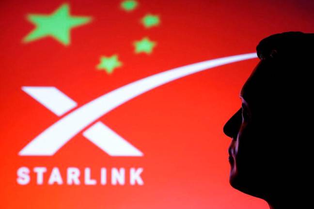 A 3D-printed miniature model of Elon Musk, a Chinese flag and the Starlink logo are seen in this illustration taken, February 20, 2025. REUTERpix