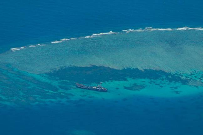 FILE PHOTO: An aerial view shows the BRP Sierra Madre on the contested Second Thomas Shoal, locally known as Ayungin, in the South China Sea, March 9, 2023. - REUTERSpix