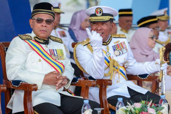Menteri Dalam Negeri Datuk Seri Saifuddin Nasution Ismail (kiri) mendengar sesuatu yang diperkatakan oleh Ketua Pengarah Agensi Penguatkuasaan Maritim Malaysia (APMM), Laksamana Maritim Datuk Mohd Rosli Abdullah pada Majlis Perbarisan Tamat Latihan Pelatih Kursus Asas Leftenan Muda Maritim Siri 12/2024 dan Pelatih Kursus Asas Laskar Kelas II Maritim Siri 18/2024 di Akademi Maritim Sultan Ahmad Shah (AMSAS). FotoBernama