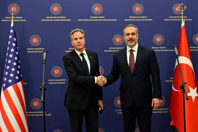 US Secretary of State Antony Blinken shakes the hand of Turkish Foreign Minister Hakan Fidan after a joint press conference at the Ministry headquarters in the Turkish capital Ankara on December 13, 2024. - ANDREW CABALLERO-REYNOLDS/Pool via REUTERS