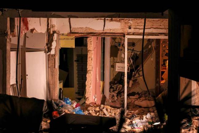 View of a damaged apartment where a man was killed and a woman was seriously wounded in an explosion, in Athens, Greece, October 31, 2024. - REUTERS/Alkis Konstantinidis