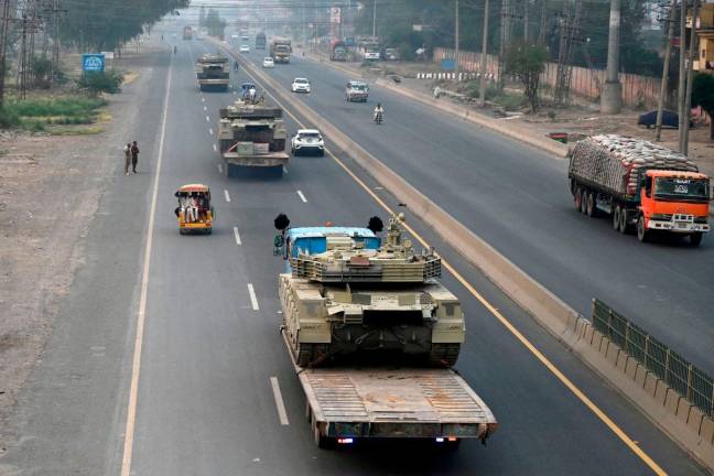 Tanks are transported on a road in Muridke near Lahore, Pakistan - REUTERSpix