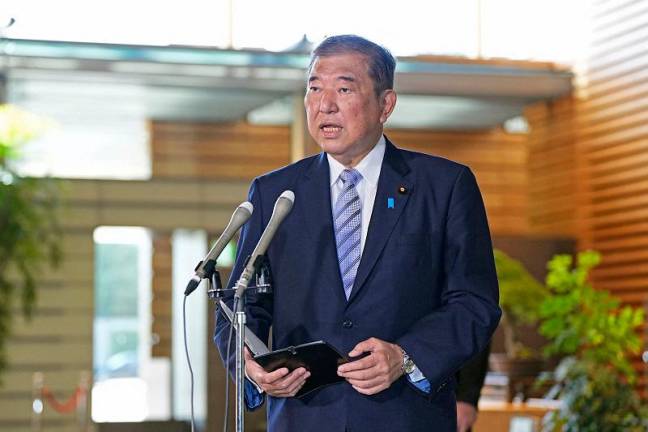 Japan’s Prime Minister Shigeru Ishiba speaks to media about North Korea’s long-range ballistic missile in Tokyo, Japan, October 31, 2024, in this photo taken by Kyodo. - Kyodo/via REUTERS