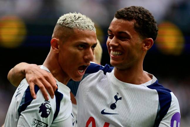 Tottenham Hotspur’s forward #09 Richarlison (L) celebrates with teammate Brennan Johnson (R) after scoring the opening goal during the English Premier League football match between Tottenham Hotspur and Burnley at the Tottenham Hotspur Stadium in London. - AFP pic