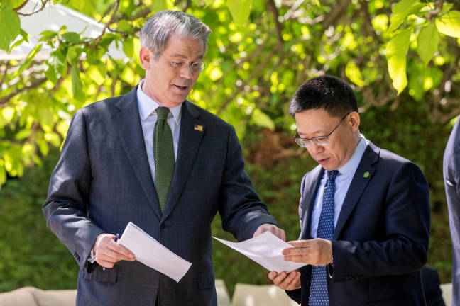 U.S. Secretary of the Treasury Scott Bessent speaks with China’s Vice Minister of Finance Liao Min, on the day of a bilateral meeting between the U.S. and China, in Geneva, Switzerland, May 11, 2025. - REUTERSpix