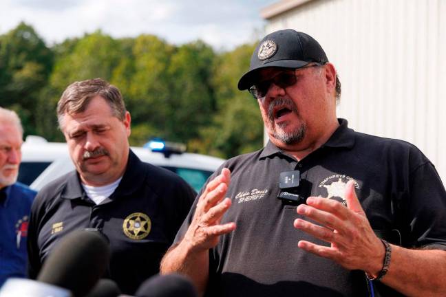 Humphreys County Sheriff Chris Davis speaks to media at Accurate Energetic Systems on October 10, 2025 in McEwen, Tennessee. An explosion this morning at Accurate Energetic Systems military munitions plant has left over a dozen people missing, with multiple fatalities reported. - Getty Images/AFP