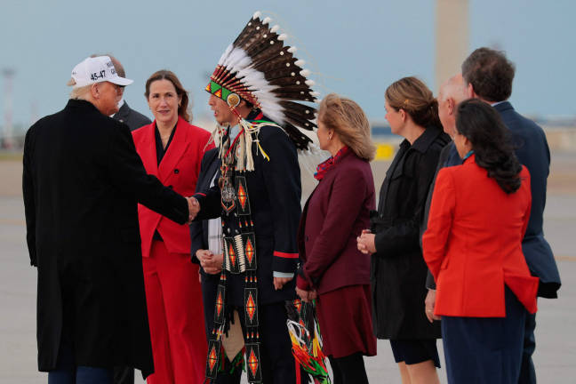 U.S. President Donald Trump speaks with Steven Crowchild, Tsuut’ina Isgiya Minor Chief, after arriving at Calgary International Airport for the G7 leaders’ summit on June 15, 2025 - AFPpix