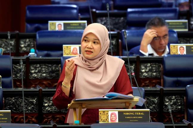Education Minister Fadhlina Sidek speaking during the tabling of the bill at the Dewan Rakyat yesterday. - Bernama pic