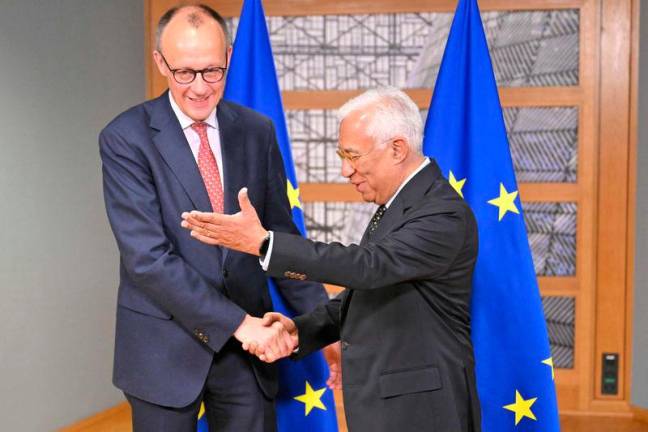 European Council President Antonio Costa (R) greets the leader of Germany’s Christian Democratic Union (CDU) Friedrich Merz ahead of the Special European Council to discuss continued support for Ukraine and European defence at the EU headquarters in Brussels on March 6, 2025. AFPpix