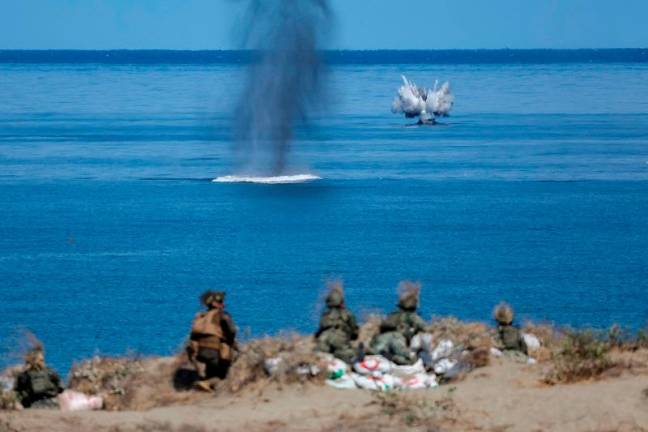 U.S. and Philippine soldiers participate in the live fire exercise during the annual joint military exercises between U.S. and Philippine troops called “Balikatan” or shoulder-to-shoulder, at Laoag, Ilocos Norte, Philippines, May 6, 2024. - REUTERS/Eloisa Lopez