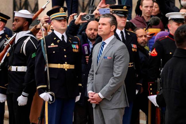 U.S. Defense Secretary Pete Hegseth waits for Israeli Prime Minister Benjamin Netanyahu on the day of their meeting, at the Pentagon in Washington, U.S., February 5, 2025. REUTERS/Kevin Lamarque/File Photo