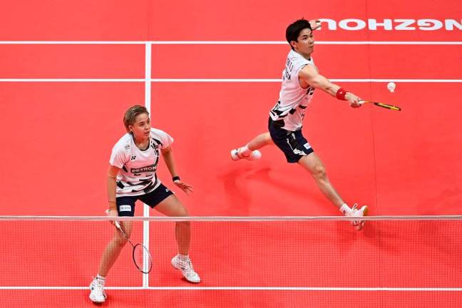 National mixed doubles pair, Chen Tang Jie-Toh Ee Wei. - AFPpix