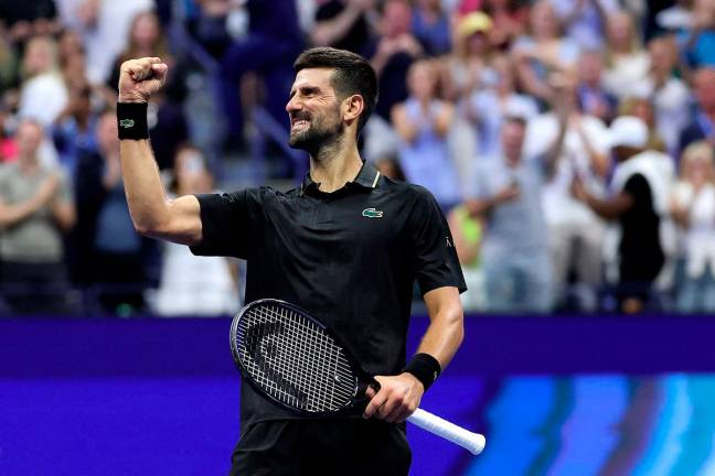 Novak Djokovic celebrates defeating Jan-Lennard Struff after their men’s singles fourth round match on day eight of the 2025 US Open - Getty Images/AFP
