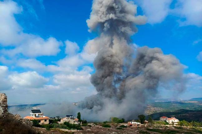 Smoke ascends after an Israeli air raid on the town of Shamaa (Chamaa) in southern Lebanon on August 1, 2024, amid ongoing cross-border clashes between Israeli troops and Hezbollah fighters. Israel's Prime Minister said on August 1, that Israel was prepared for any aggression against it following threats of retaliation for the killings of top Hamas and Hezbollah figures. (Photo by KAWNAT HAJU / AFP)