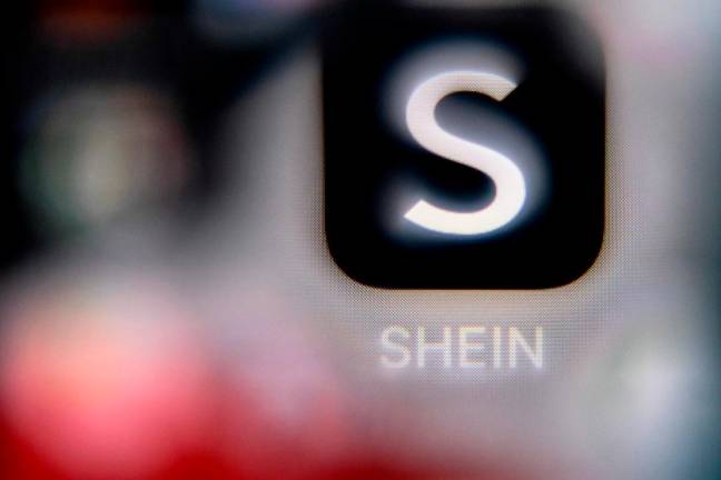A photo taken on April 16, 2025 shows the Chinese e-commerce company Shein app logo on a smartphone screen. - AFPpix