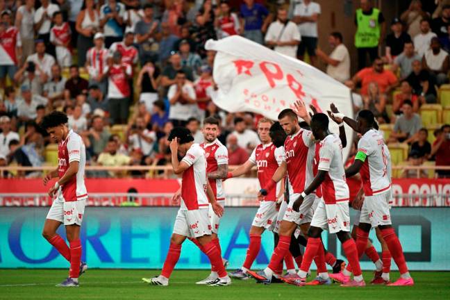 Monaco’s players celebrate the goal of Monaco’s defender Eric Dier (3R) during the French L1 football match between AS Monaco and Le Havre AC at the Louis II Stadium in the Principality of Monaco on August 16, 2025. - AFP