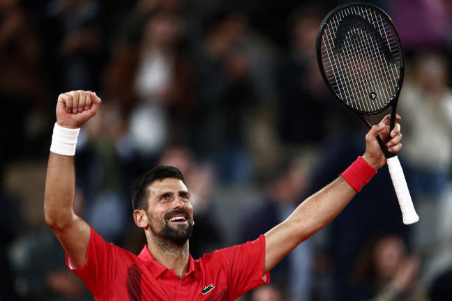 Serbia’s Novak Djokovic celebrates after winning against Germany’s Alexander Zverev at the end of their men’s singles quarter-final match on day 11 of the French Open tennis tournament on Court Philippe-Chatrier at the Roland-Garros Complex in Paris on June 4, 2025. - AFPpix