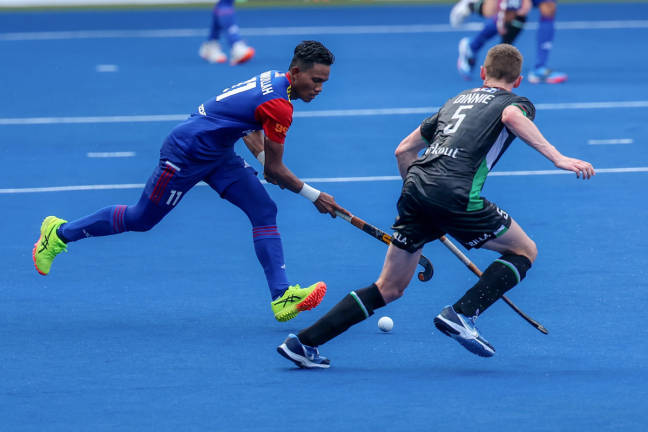Malaysia’s player, Akhimullah Anuar (left), is challenged by Wales’ player Dinnie Alf during the 5th–6th place classification match between Malaysia and Wales at the FIH Hockey Nations Cup 2024–25 at the National Hockey Stadium in Bukit Jalil today. - BERNAMA