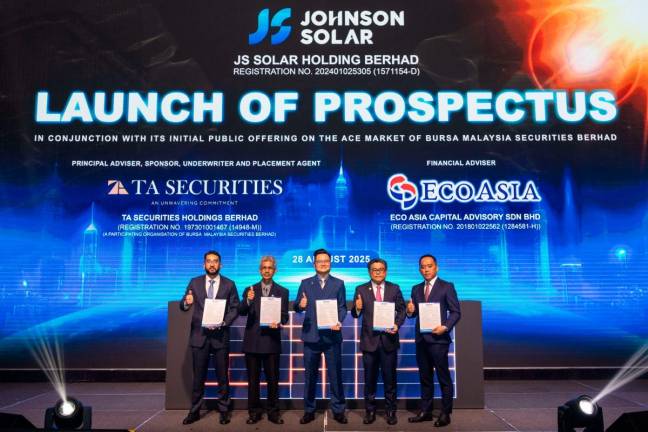 Launching the prospectus. (From left to right): JS Solar promoter and substantial shareholder Ikwan Hafiz Jamaludin, independent non-executive chairman Datuk Ir Ahmad Fauzi Hasan, Chai, TA Securities Holdings Bhd head of corporate finance Ku Mun Fong and Eco Asia Capital Advisory Sdn Bhd managing director Kelvin Khoo.