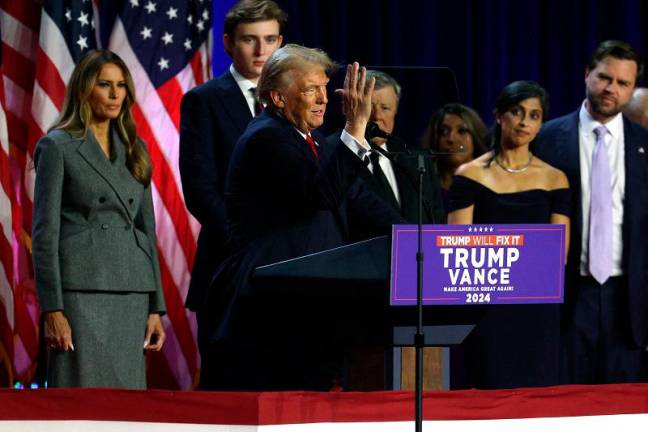 Republican presidential nominee, former U.S. President Donald Trump speaks during an election night event at the Palm Beach Convention Center on November 06, 2024 in West Palm Beach, Florida. Americans cast their ballots today in the presidential race between Republican nominee former President Donald Trump and Vice President Kamala Harris, as well as multiple state elections that will determine the balance of power in Congress. - John Moore/Getty Images/AFP