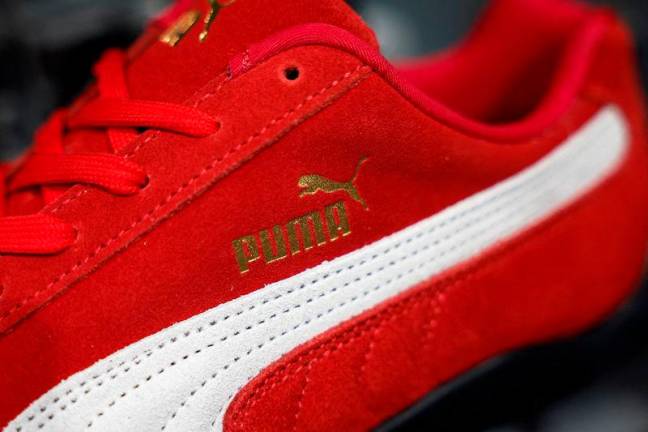 A Puma Speedcat OG sneaker is displayed at a store in Paris, France, Jan 24, 2025. REUTERSpix