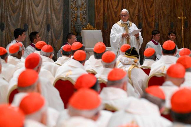 This photo taken and handout on May 9, 2025 by The Vatican Media shows Pope Leo XIV during a mass with cardinals in the Sistine Chapel in The Vatican. - AFP PHOTO / VATICAN MEDIA