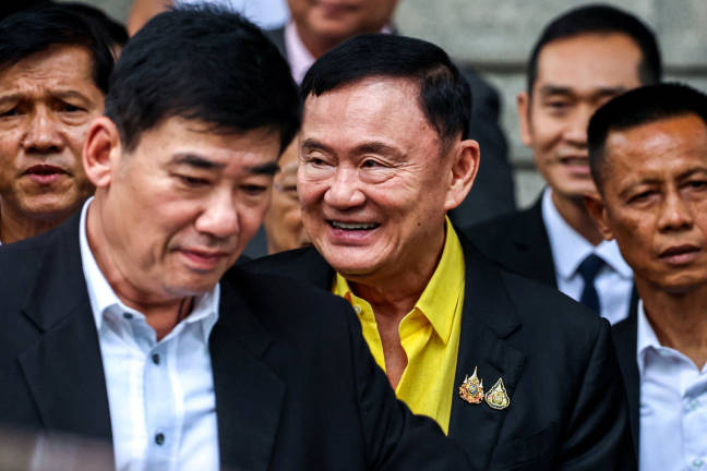 Former Thailand Prime Minister Thaksin Shinawatra leaves the Criminal court after appearing for the hearing of a lese majeste case, also known as a royal insult case in Bangkok, Thailand, August 19, 2024. - REUTERSpix