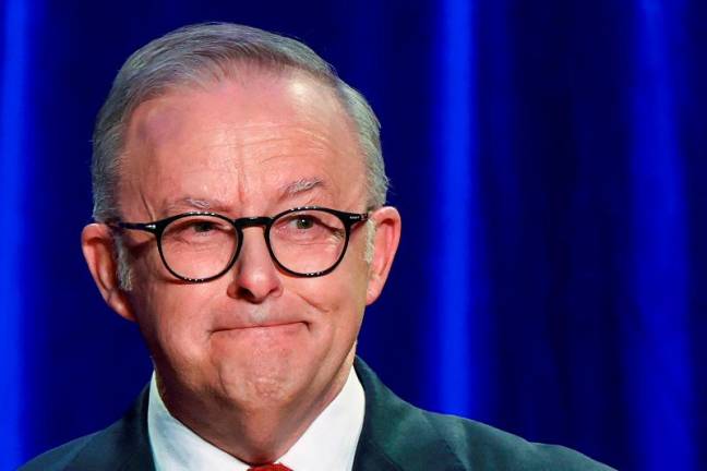 Australia’s Prime Minister Anthony Albanese reacts as he speaks at a Labor party election night event, after local media projected the Labor Party’s victory, on the day of the Australian federal election, in Sydney, Australia, May 3, 2025. - REUTERS/Hollie Adams
