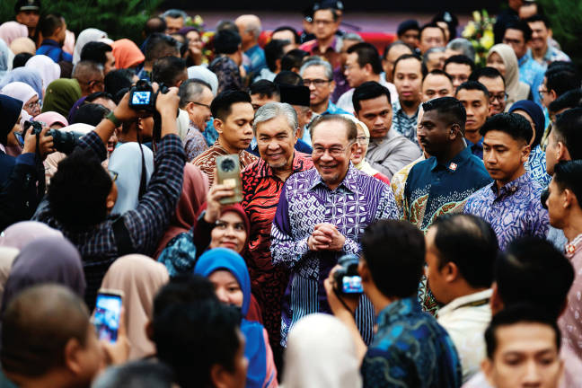 Prime Minister Datuk Seri Anwar Ibrahim and Deputy Prime Minister Datuk Seri Dr Ahmad Zahid Hamidi arriving for the Prime Minister’s Monthly Assembly at Puspanitapuri Dewan De Seri Endon in Putrajaya yesterday. – BERNAMApix