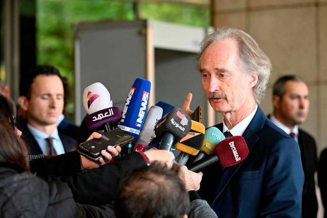 United Nations Special Envoy for Syria Geir Pedersen speaks to members of the media as he leaves a hotel in Damascus on November 24, 2024. - LOUAI BESHARA / AFPpix