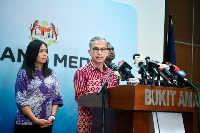 Communications Minister Datuk Fahmi Fadzil during press conference in Bukit Aman after meeting TikTok officials today. - Pic courtesy Communications Ministry