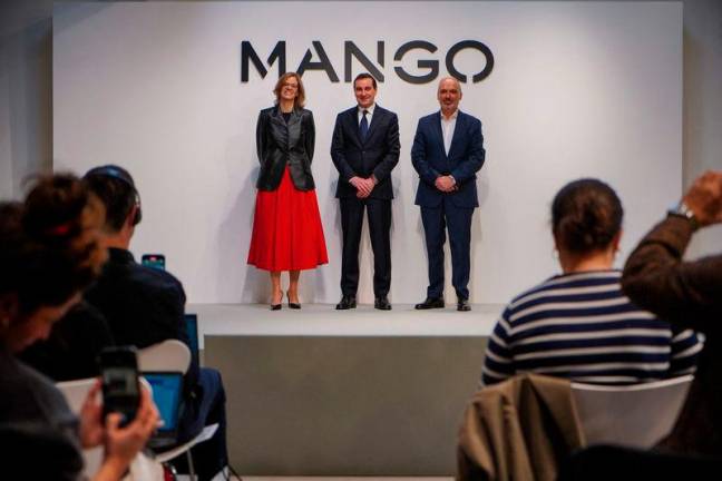 Mango Chairman and CEO Toni Ruiz, (C) poses with Chief Financial Officer Margarita Salvans (L), and Chief Expansion and Franchise Officer Daniel Lopez before a press conference to present their 2024 financial results in Palau-solita i Plegamans, north of Barcelona, on March 10, 2025. AFPpix