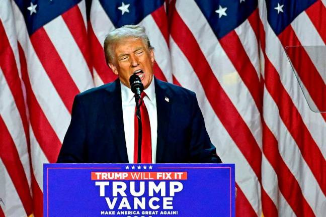 Former US President and Republican presidential candidate Donald Trump speaks during an election night event at the West Palm Beach Convention Center in West Palm Beach, Florida, early on November 6, 2024. Republican former president Donald Trump closed in on a new term in the White House early November 6, 2024, just needing a handful of electoral votes to defeat Democratic Vice President Kamala Harris. - Jim WATSON / AFP