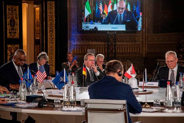 US Secretary of Defense Lloyd Austin (L), German Defence Minister Boris Pistorius (4L), Canada's Defence Minister Bill Blair and France's Defence Minister Sebastien Lecornu (foreground) listen Italy's Defense Minister Guido Crosetto (not pictured) speak during a morning roundtable as part of the Group of Seven (G7) Defence Ministers Summit at the Palazzo Reale in Naples, Italy, on October 19, 2024. - AFP PHOTO / Italian Ministry of Defence