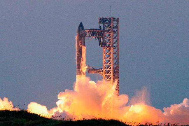 SpaceX’s Starship lifts off during its fifth flight test, in Boca Chica, Texas, U.S., October 13, 2024. - REUTERS/Kaylee Greenlee Beal