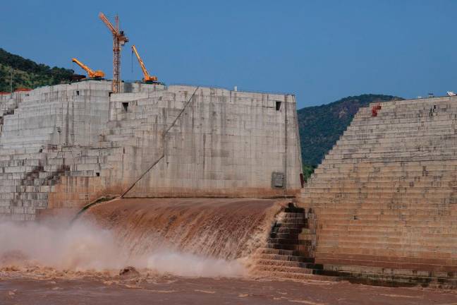 Water flows through Ethiopia’s Grand Renaissance Dam as it undergoes construction work on the river Nile in Guba Woreda, Benishangul Gumuz Region, Ethiopia September 26, 2019. - REUTERS