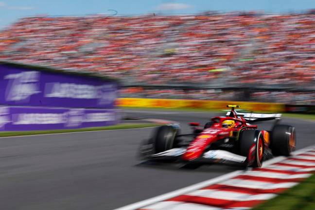 Lewis Hamilton of Great Britain driving the (44) Scuderia Ferrari SF-25 on track during the F1 Grand Prix of Canada at Circuit Gilles-Villeneuve on June 15, 2025 in Montreal, Quebec. - Mark Thompson/Getty Images/AFP