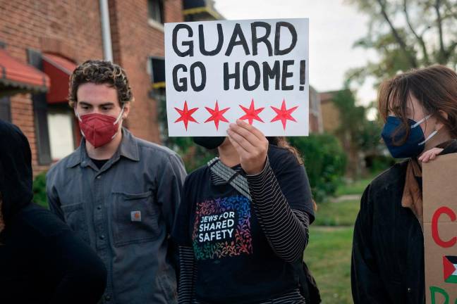 Demonstrators protest near the immigration processing and detention facility on October 10, 2025 in Broadview, Illinois. Demonstrations have been taking place outside of the facility for several weeks as the Trump administration’s Operation Midway Blitz has been underway, arresting and detaining immigrants in the Chicago area. - Getty Images/AFP