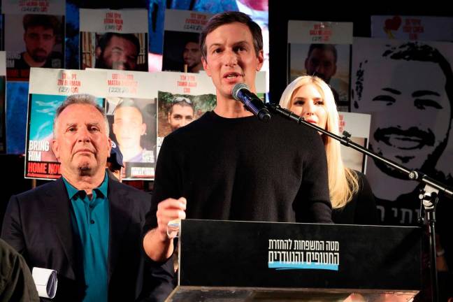 US businessman Jared Kushner (C) speaks as his wife Ivanka Trump (R) and US special envoy Steve Witkoff (L) look on during a gathering at Hostages Square in Tel Aviv on October 11, 2025. - AFP