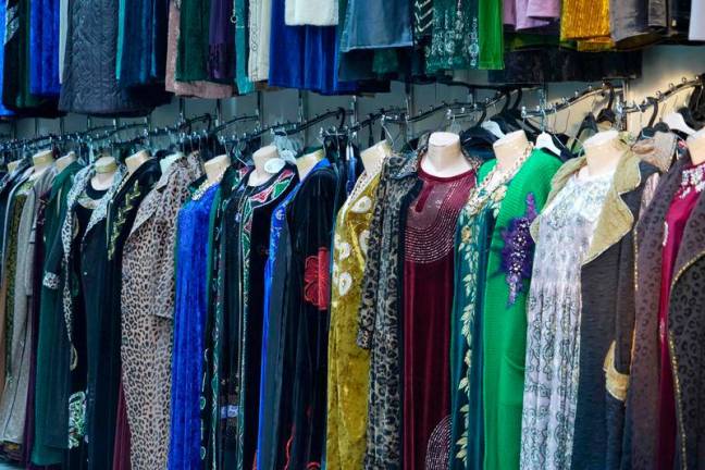 National clothes on sale in a shop at Korvon bazaar in Dushanbe . AFPpix