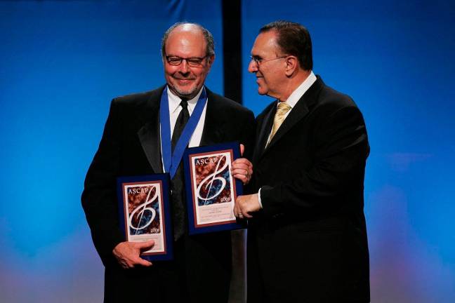 Composer Mark Snow (L) and ASCAP CEO John LoFrumento - Photo by Neilson Barnard / GETTY IMAGES NORTH AMERICA / AFP