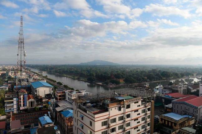 A general view shows Myanmar's second largest city Mandalay on October 24, 2024. Winding through the lawless, rugged hills of northern Myanmar National Highway 3 links together a stunning series of victories by ethnic rebels and pro-democracy fighters in their war against the junta. An offensive launched a year ago on October 27, 2023 has seen opponents of the military seize much of the 480 kilometres (300 miles)-long route that connects second city Mandalay to China, Myanmar's biggest trade partner. - AFPpix