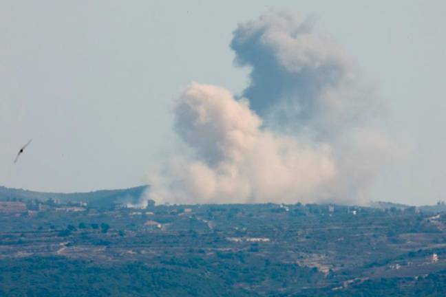 Smoke billows amid the ongoing hostilities between Hezbollah and Israeli forces, as seen from Tyre, southern Lebanon October 4, 2024. - REUTERS/Aziz Taher