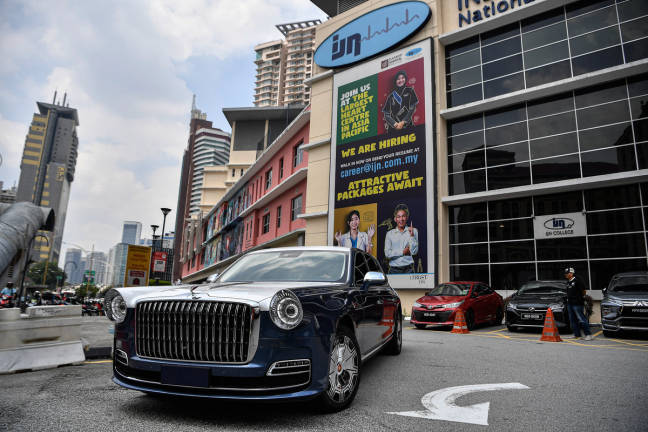 The vehicle believed to be carrying the wife of the Sultan of Brunei, Raja Isteri Pengiran Anak Saleha, along with other members of the royal family, was seen departing the grounds of the National Heart Institute (IJN), Kuala Lumpur. - BERNAMApix